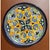 The Deruta Majolica ceramic wall plate is hand painted with Ricco Deruta Giallo classic decoration featuring flowering...