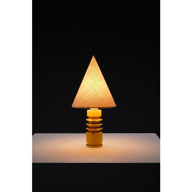 period: 1940s origin: Belgium dimensions: h38 x w18 x d18 cm material: wood, new linen shade I have official proof of...