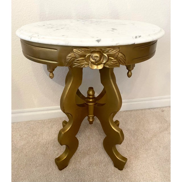 Vintage Victorian Style Oval Accent/Side Table. Painted a luxurious gold color. The marble top is removable. I also have...