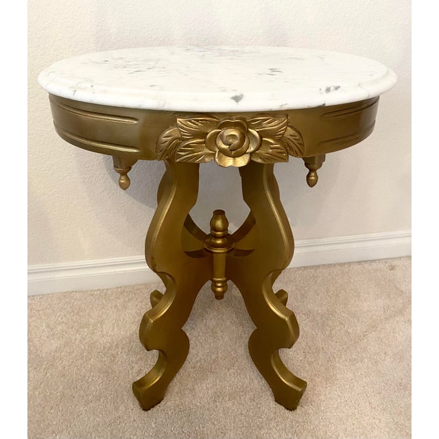 Vintage Victorian Style Oval Accent/Side Table. Painted a luxurious gold color. The marble top is removable. I also have...