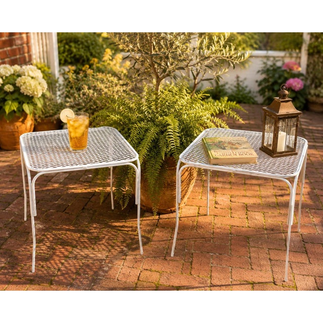 Bring timeless mid-century charm to your indoor living space or backyard oasis with this fabulous set of two vintage white...