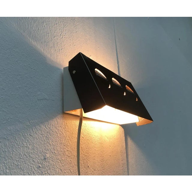 Vintage Danish Space Age Wall Lamp from Hamalux, in Very Good conditions. Designed 1970 to 1979 This piece has an...