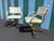 A Pair of Early 1990s Post Modern Brass Rolling Dining Chairs by Cal-Style Furniture. Features Brass Frames with the...