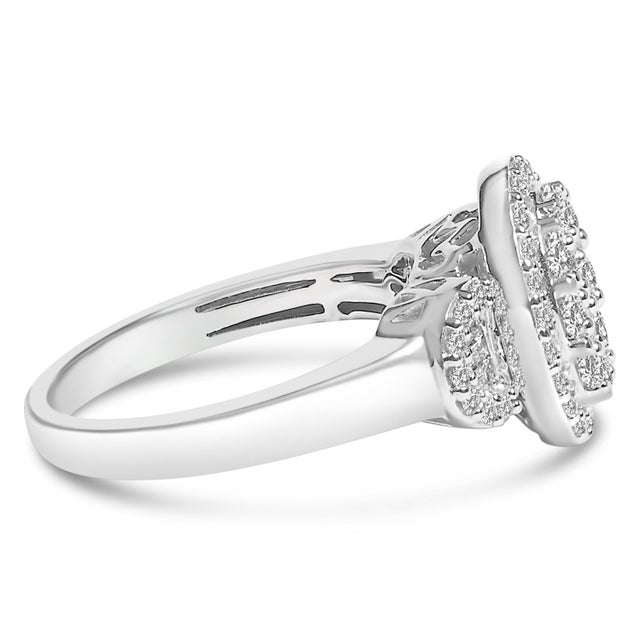 Discover the elegance of eras past with this exquisite 10K white gold statement ring, plated in gleaming rhodium to...