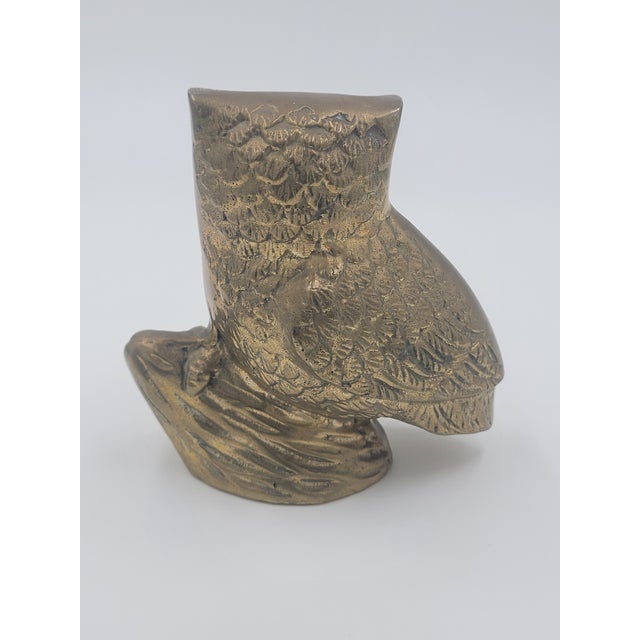 Bring a touch of classic mid-century charm to your shelves with this vintage solid brass owl figurine. Perched...
