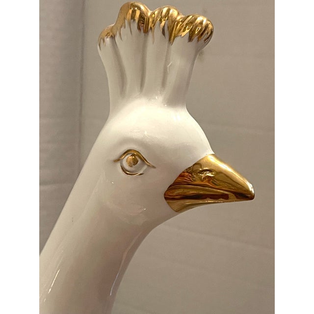 Gorgeous white smooth porcelain figurine by the Premier Italian company Capodimonte. Desires gold trim. A substantial...