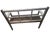 A distinctive rustic farmhouse bench featuring an architectural window-frame back, a dark-stained wooden seat and...