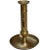 Midcentury Moroccan hand-crafted candlestick constructed of solid brass, exhibiting an intricate brass rims and details...