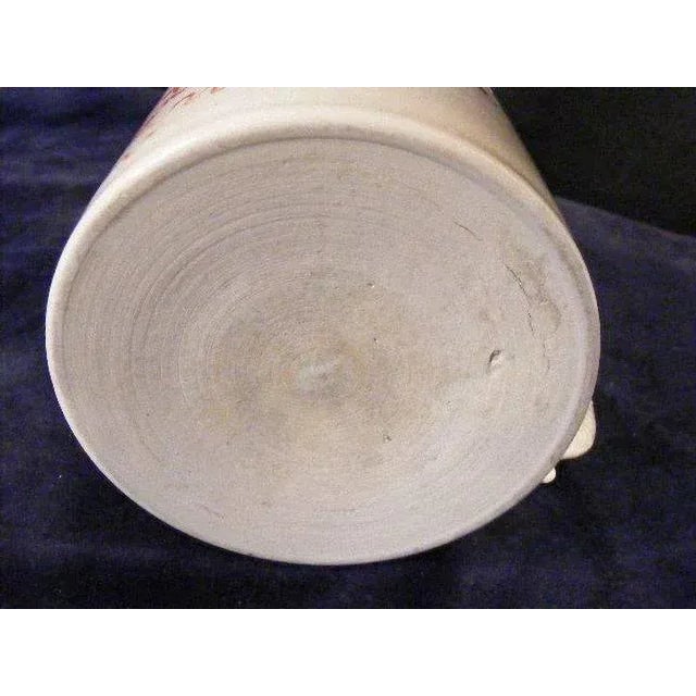 Large Chinese export porcelain mug with serpent handle. Finely hand decorated with colorful floral and vine scheme....