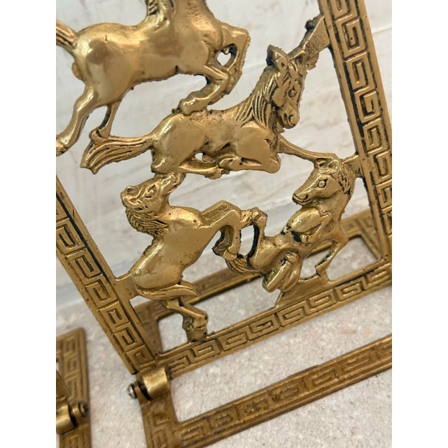 Vintage Chinoiserie Brass Horse Bookends With a Cut-Out Design of Galloping Horses Surrounded by a Greek Key Border-a Pair For Sale - Image 4 of 12