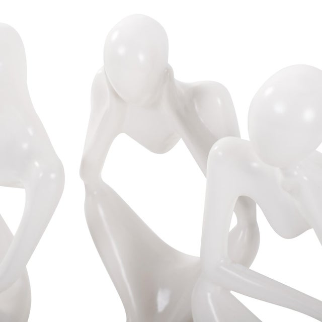 A captivating piece that appears as three distinct sculptures unified in harmony. Crafted with a matte white finish and...