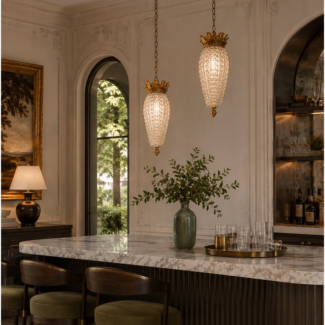 A dramatic pair of Mid Century Hollywood Regency pendant lights by Light Craft of California, Los Angeles. These dramatic...