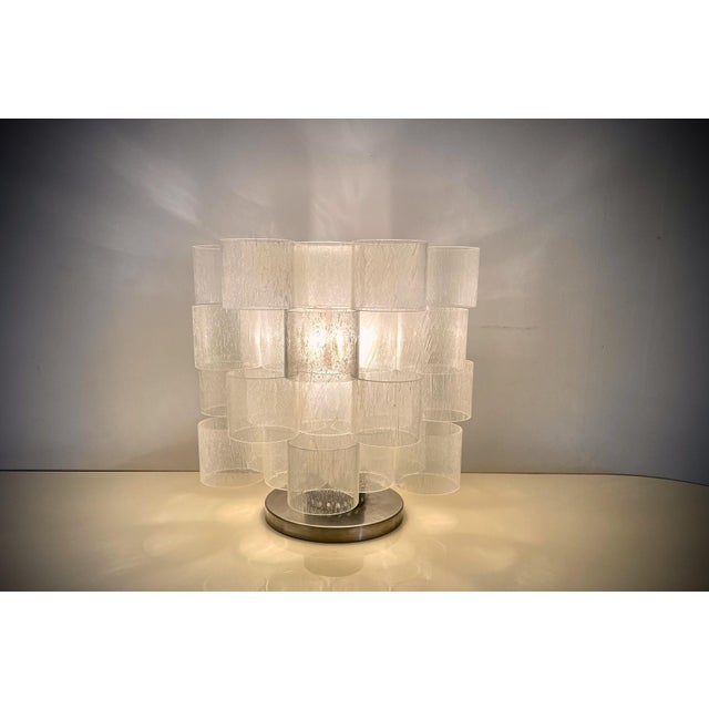 An exceptional and highly sculptural "Globula" table lamp crafted in Italy during the 1970s by Poliarte. Its unique...