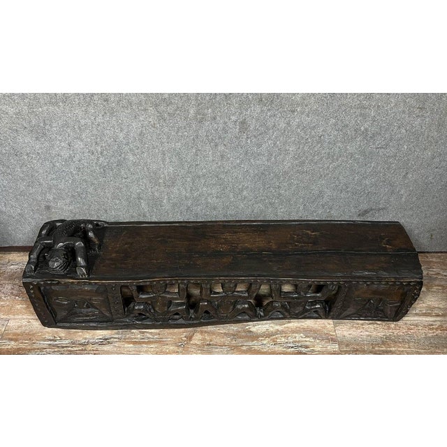 Rare Bamileke bed from Cameroon, hand-carved from a single piece of wood, with a leopard-shaped pillow, late 19th century...