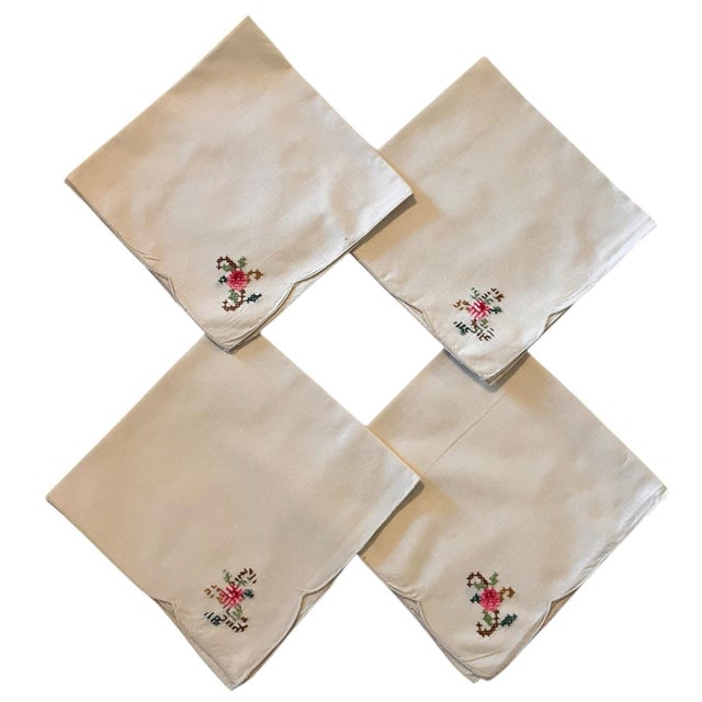 Beautiful, elegant hand-embroidered set of 6 cream napkins. They have a beautiful embroidered rose on one of the corners....
