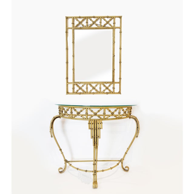 Transform your space with this stunning vintage faux bamboo demilune console table and matching mirror. This eye-catching...