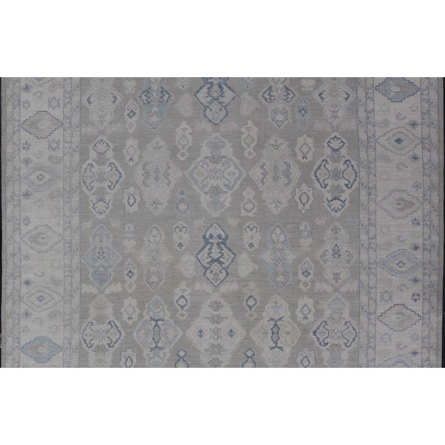 Measures: 13'4 x 14'10 Turkish Oushak Rug with Soft Gray Field and Pale Blue Geometric Motifs. Keivan Woven Arts. rug...