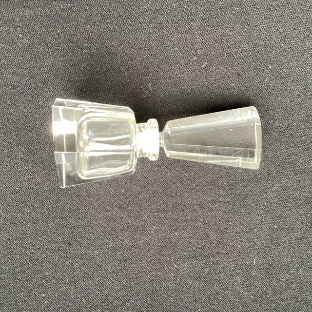 Vintage lead glass perfume bottle with stopper. Six sided bottle with crystal stopper.