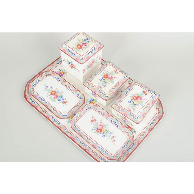Foley Art China (John Aynsley & Sons) Hand-painted porcelain “Peacock” set, mid-20th century. Rectangular tray with four...