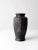 This 1920s Japanese Tokanabe vase is a unique piece of mold-pressed pottery that showcases a classic texturized floral...