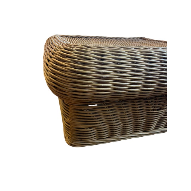 Large Handwoven wicker coffee table featuring a substantial rolled edge top, beautifully woven Chevron side panels, and a...