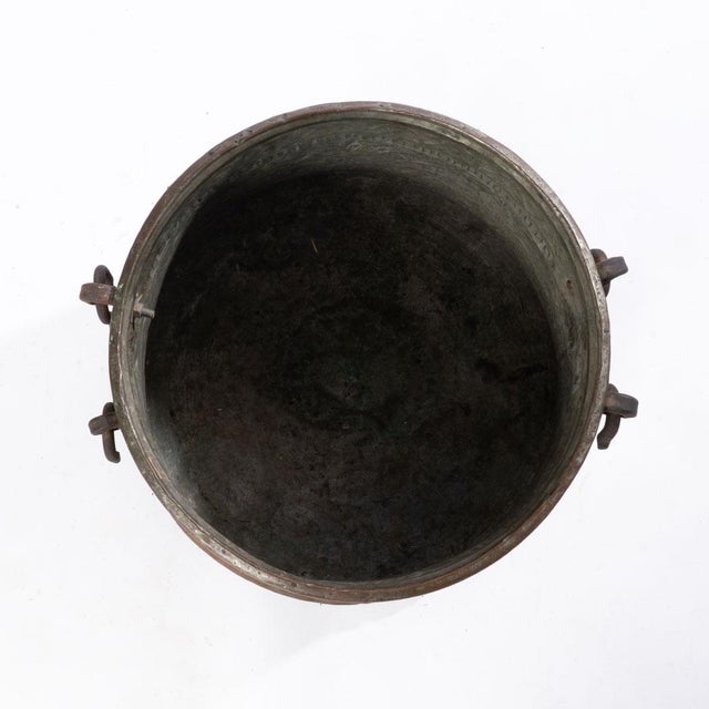 Large copper pot that would look great in a kitchen or entry way. Beautiful designs etched into this piece. No cracks so...