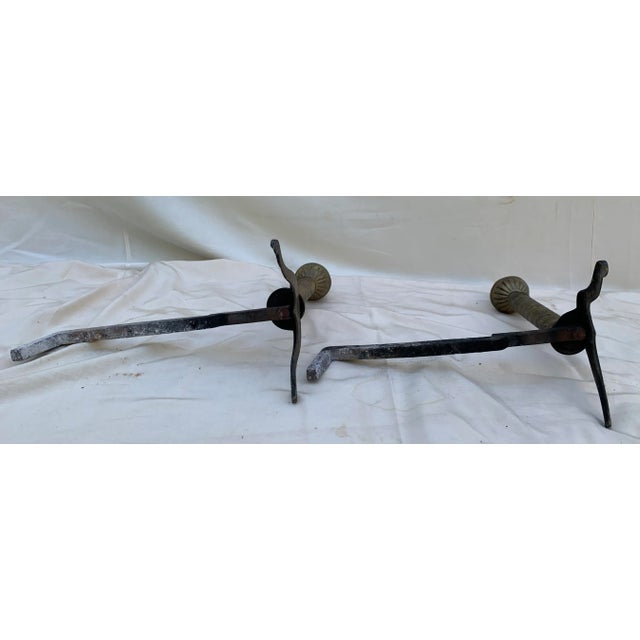 Vintage Wrought Iron and Brass Andirons with hammered and stamped brass decoration.