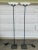 A pair of vintage, Signed 1980s torchiere floor lamps by Koch & Lowy. Painted black square weighted iron base supports...