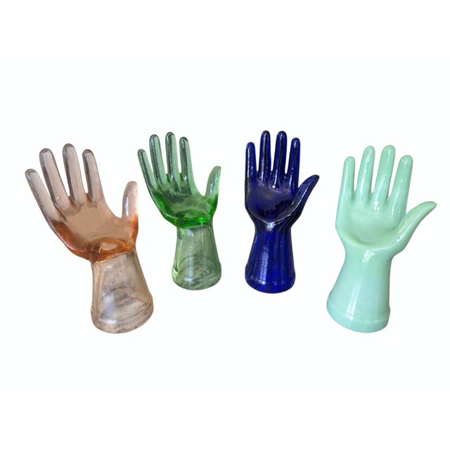 A set of 4 Glass Hand Casts featuring the following colors: Cobalt Blue, Jadeite, Rose Gold, and Bottle Green Each...