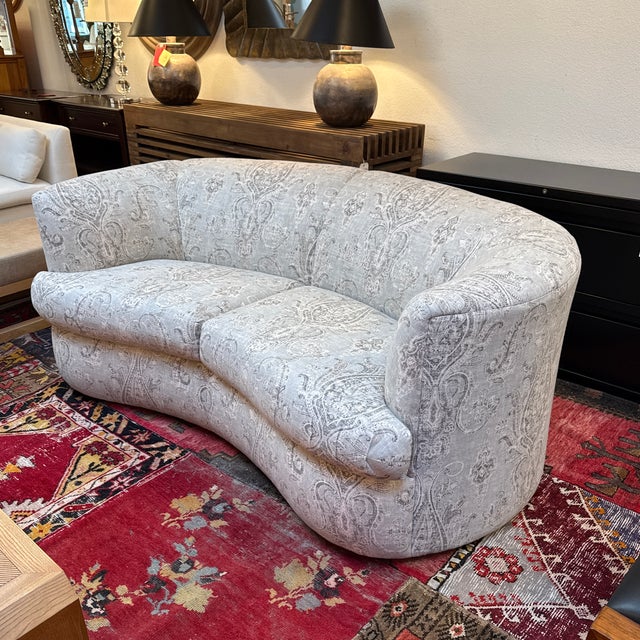 Design Plus Gallery presents a Post Modern Vladimir Kagan Sofa. The uniquely pleasant kidney-shaped sofa marries...