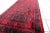 Vintage red woolen rug from Germany made in Baluch style. The rug is in deep red and emerald shades. It is from the middle...