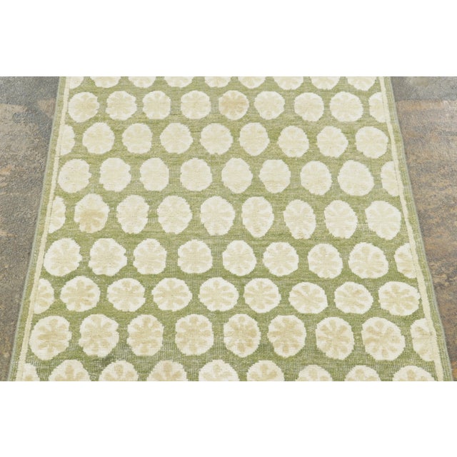 Made with hand-knotted natural silk, this 2x8 runner rug is a sophisticated addition to Rug & Kilim’s Block Print...