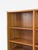 High-quality and timeless teak bookcase with six adjustable shelves, each with a beveled front. The shelves slide onto...