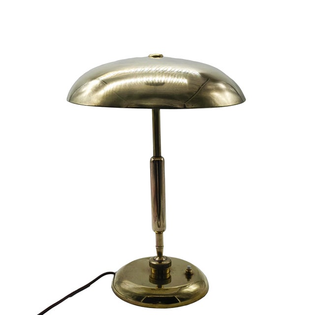 Rare brass table lamp designed by architect Giovanni Michelucci and produced in the 1950s in Italy by Lariolux. The lamp...