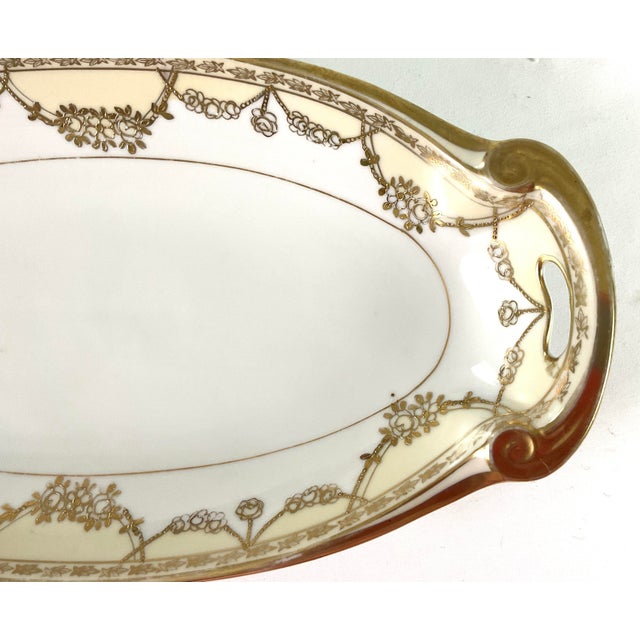 Nippon-porcelain, long oval porcelain platter White center, with a very pale yellow border-meticulously hand painted...