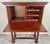 An exquisite wine bar secretary cabinet by South Cone Trading Company. An elegant embodiment of traditional craftsmanship,...