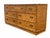 A beautiful 7 drawer low dresser. In the campaign style made by Dixie furniture. Super mixed element design having finely...