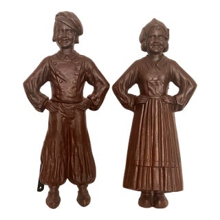 Antique Early 20th Century Sheffield Cast Iron Dutch Boy & Girl Statues - A Pair For Sale