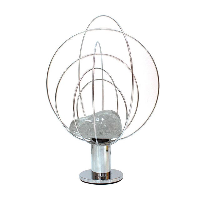 The Barnaba lamp by Angelo Brotto, produced by the Spanish firm Fase under the name Planeta, is one of the most iconic...