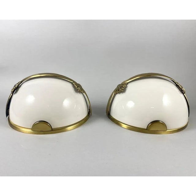 Vintage wall sconces made of authentic opaline glass and brass. from spanish manufacturer cuenca iluminacion s.a. circa...