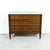 A refined 20th century Parisian commode attributed to the legendary Parisian design firm Maison Jansen, a name synonymous...