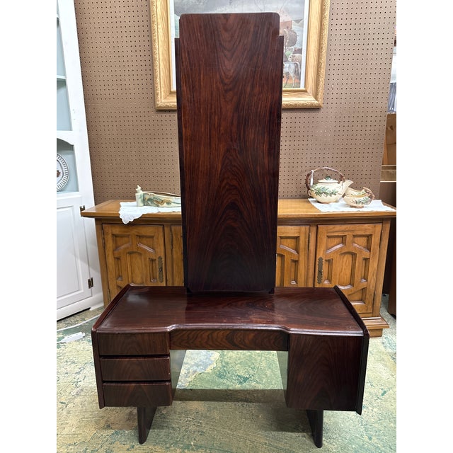 Exceptional 1950s Rosewood Petite Vanity Table with attached folding mirror. This unique piece is petite in size perfect...