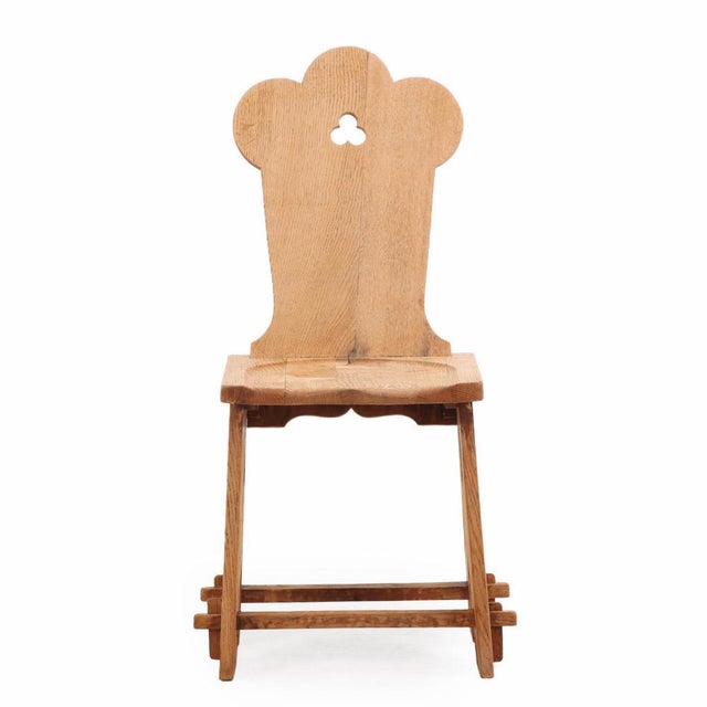 In combination with the solid trefoil carved back rests, the solid seats and splayed legs joined by a lower medial...