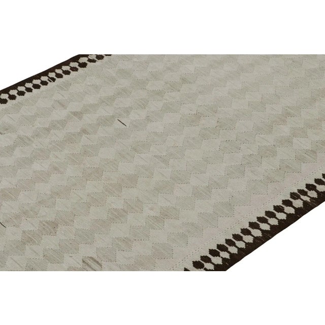 This vintage 5x10 Persian Kilim is a mid-century tribal rug believed to hail from the Shahsavan tribe—handwoven in wool...