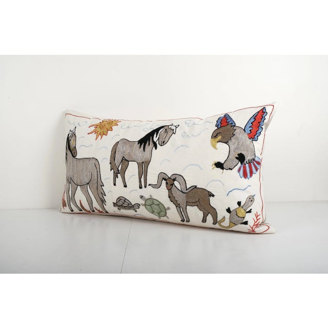 Suzani Horse Pictorial Bedding Cushion 18'' X 35'' Suzani is an exquisite fabric, every piece is unique but can also...