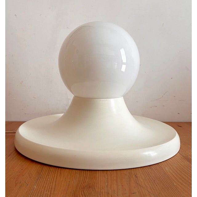Gorgeous ivory Light Ball, designed by Achille Castiglioni for Flos in Italy in the 1960s. Made of white metal and opaline...