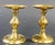 Pair of brass polished candlesticks with a molded hexagonal base. Hand-tooled contemporary brass candlesticks with round...