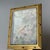 Vintage decorative brass boudoir desk clock. The clock face features an art print of “The Swing” by Fragonard. Mechanical...