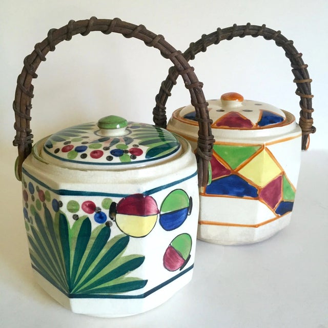 This set of two rare vintage 1930's Art Deco Japan hand painted porcelain handled ceramic biscuit barrel jars is an...