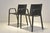Two armchairs with leather upholstery, signed Poltrona Frau An elegant pair of armchairs from Poltrona Frau, crafted from...